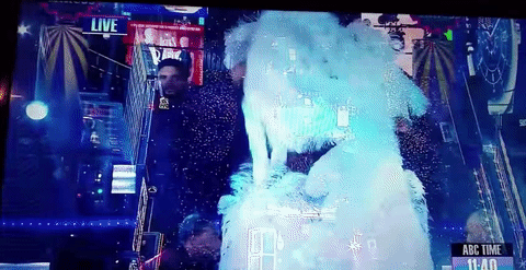 Mariah Carey GIF- new Year's Eve GIF- Ear piece GIF
