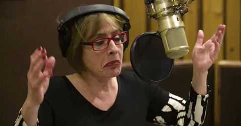 Patti LuPone GIF- Shrug GIF